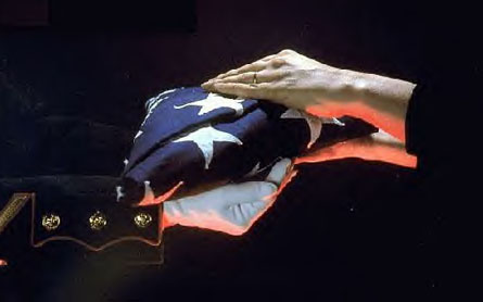 folding american flag at funeral